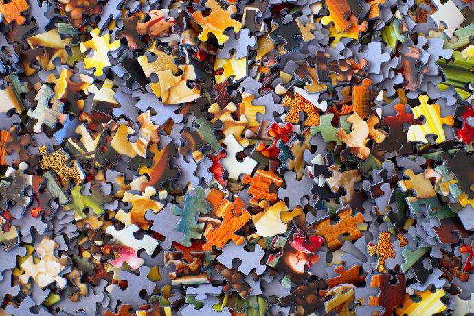 stack of jigsaw puzzle pieces